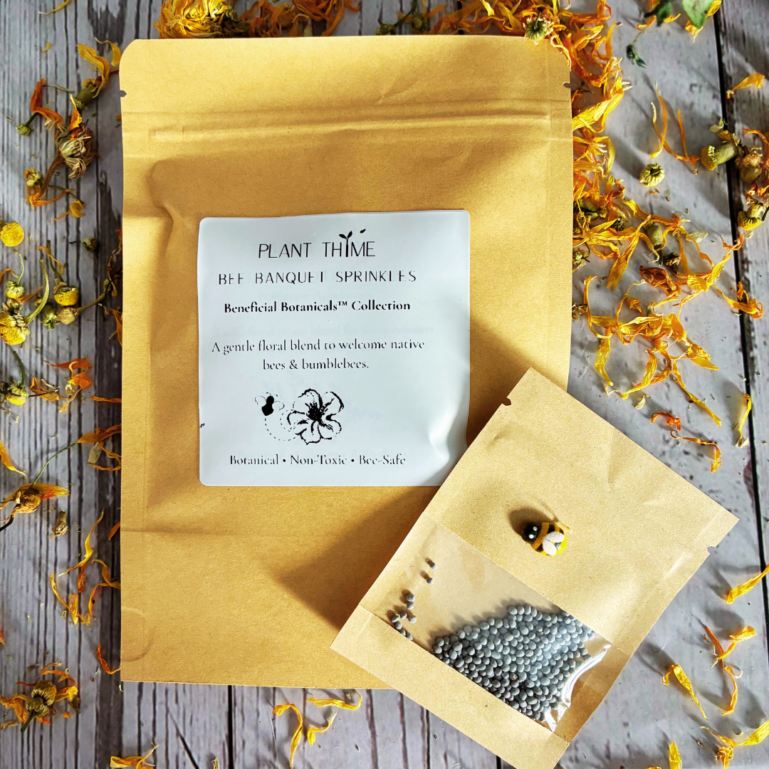 Plant Thyme Bee Banquet Sprinkles packaging with white cloverbee seeds on a wooden surface with dried flowers for pollinator gardens