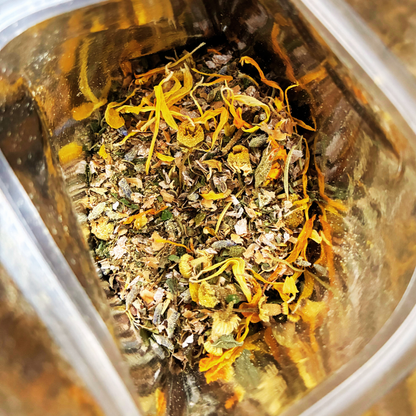 Plant Thyme beneficial insect/ladybug Sprinkles packaging with white evening primrose seeds on a wooden surface with dried flowers for pollinator gardens