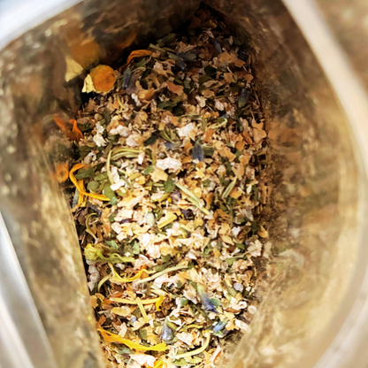 Plant Thyme evening pollinator Sprinkles packaging with white evening primrose seeds on a wooden surface with dried flowers for pollinator gardens