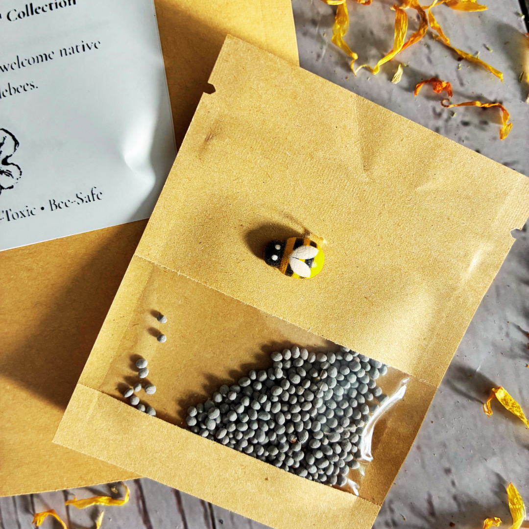 Plant Thyme Bee Banquet Sprinkles packaging with white cloverbee seeds on a wooden surface with dried flowers for pollinator gardens